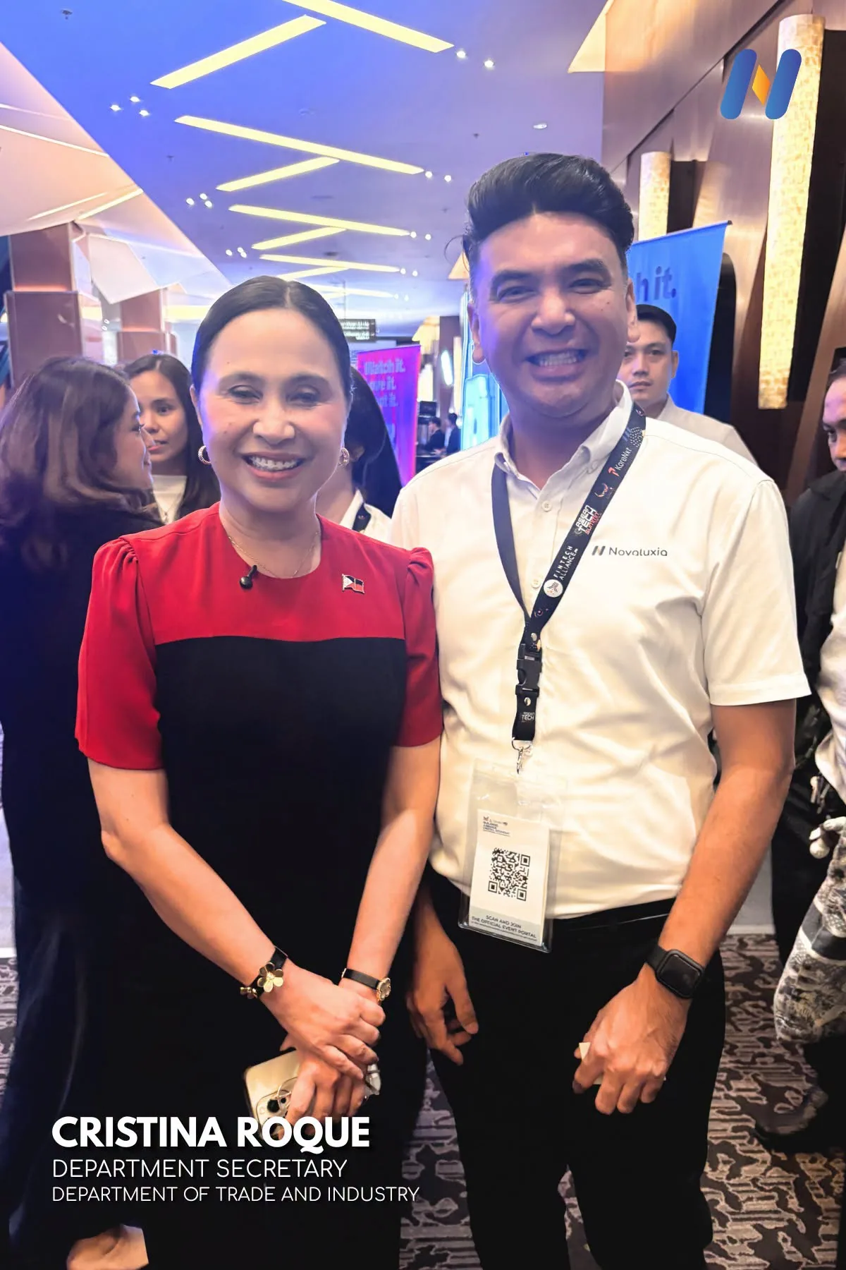 Novaluxia PH team member photographed with Cristina Alderete Roque, Secretary, Department of Trade and Industry, on the event floor